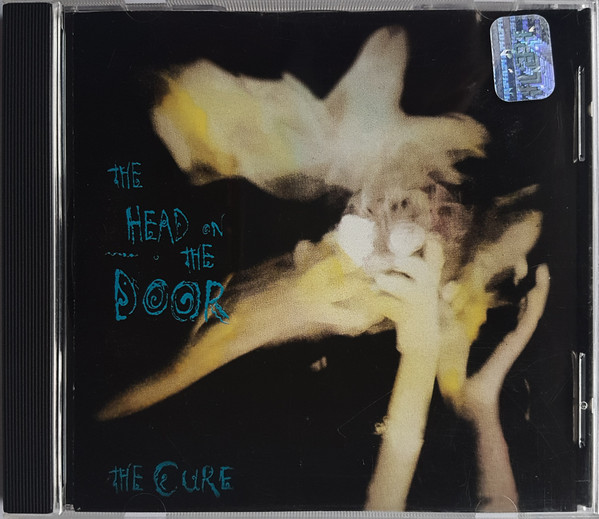 Cure, The - The Head On The Door